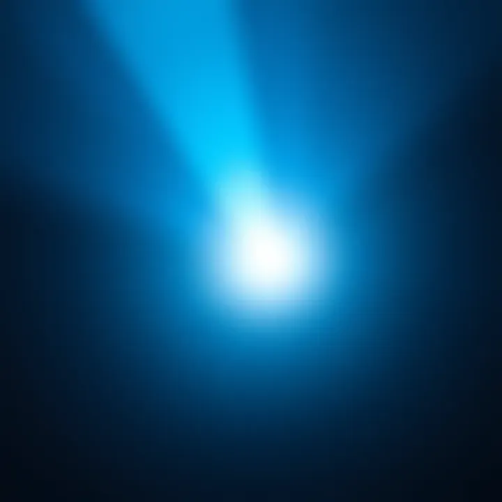 The 3I/ATLAS comet shining bright and blue in the sky as it nears the sun at perihelion, creating a distinct cosmic view.