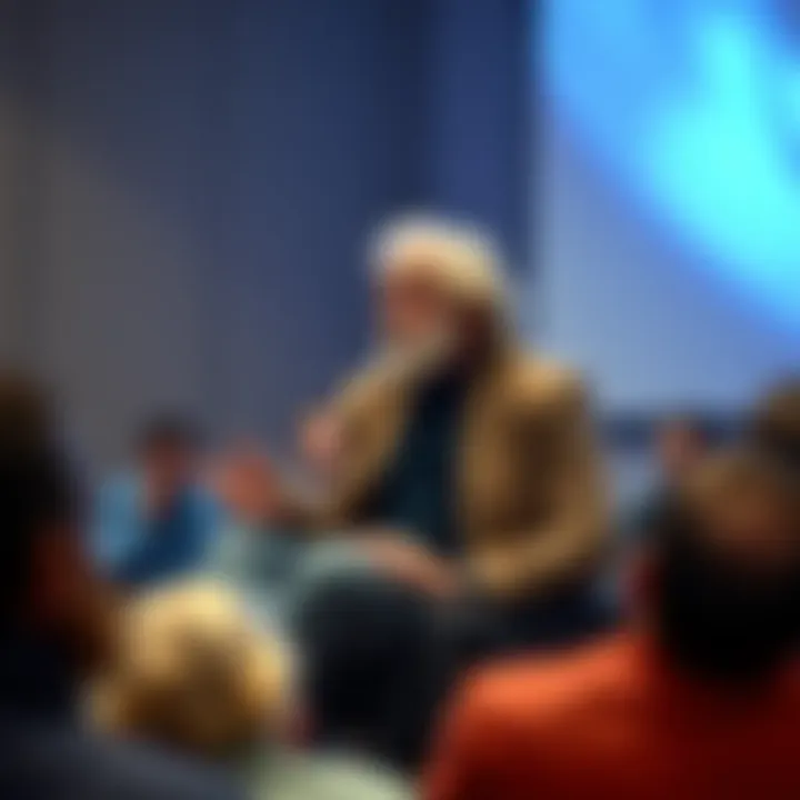 Alan Watts seated, engaging in conversation about ego and ambition, with an audience around him