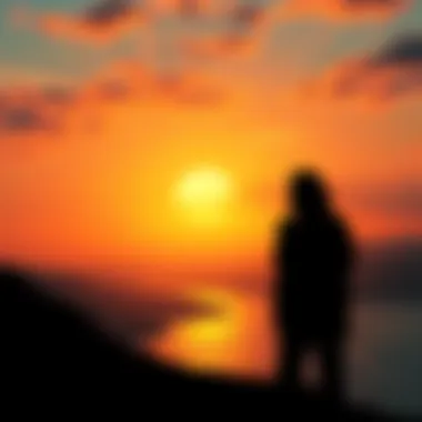 A peaceful landscape with a silhouette of a thinker representing Alan Watts, illustrating his influence on spirituality