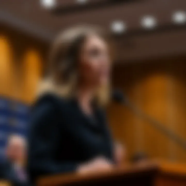Amy Eskridge stands at a podium during a seminar, looking concerned after receiving an indirect threat