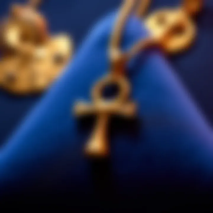 A close-up view of a shiny Ankh pendant made of gold, resting on a soft velvet cloth, highlighting its ancient Egyptian design.