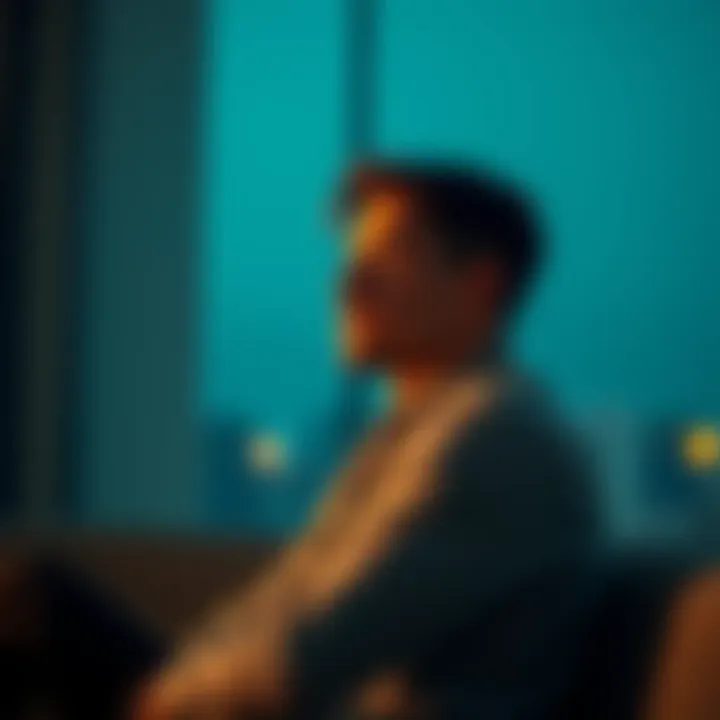 A thoughtful Aquarius man sitting alone, reflecting on a relationship ending, with a distant look and a pensive expression.