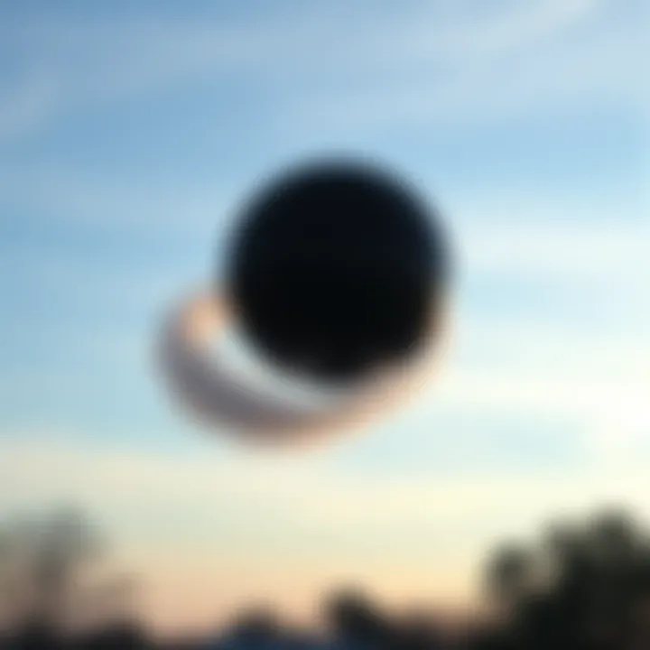 A black spherical unidentified aerial phenomenon is seen morphing in the sky over Niles, Illinois, with witnesses observing its unusual movements.