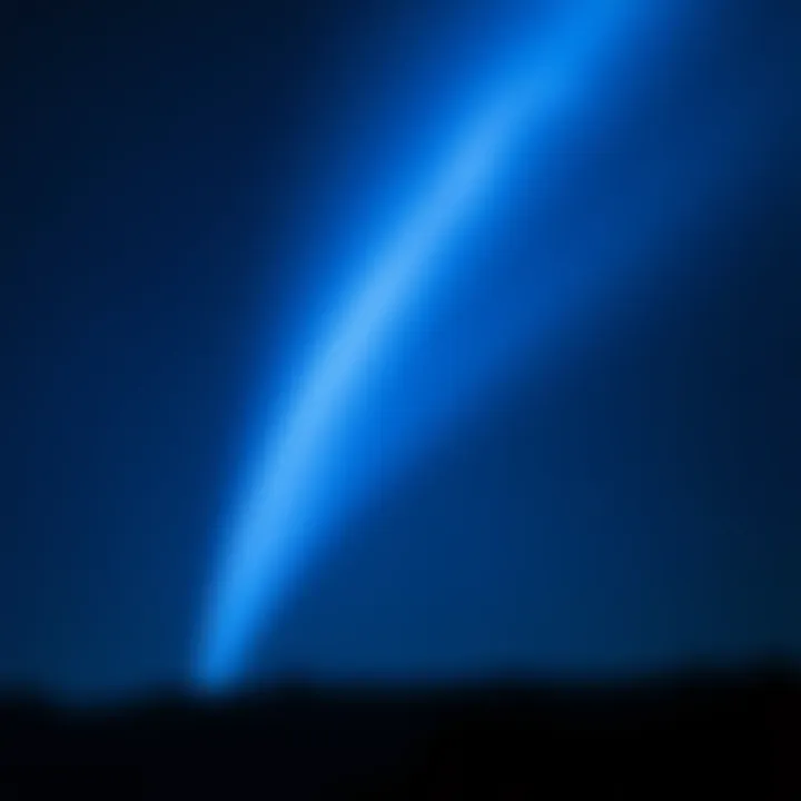 A bright blue tail of light stretches across the dark night sky, capturing the attention of curious onlookers below.