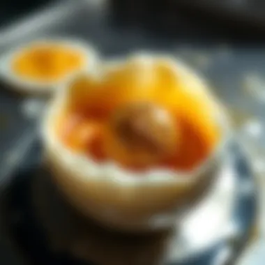 A close-up of a cracked egg with an unusual object inside while boiling on the stove