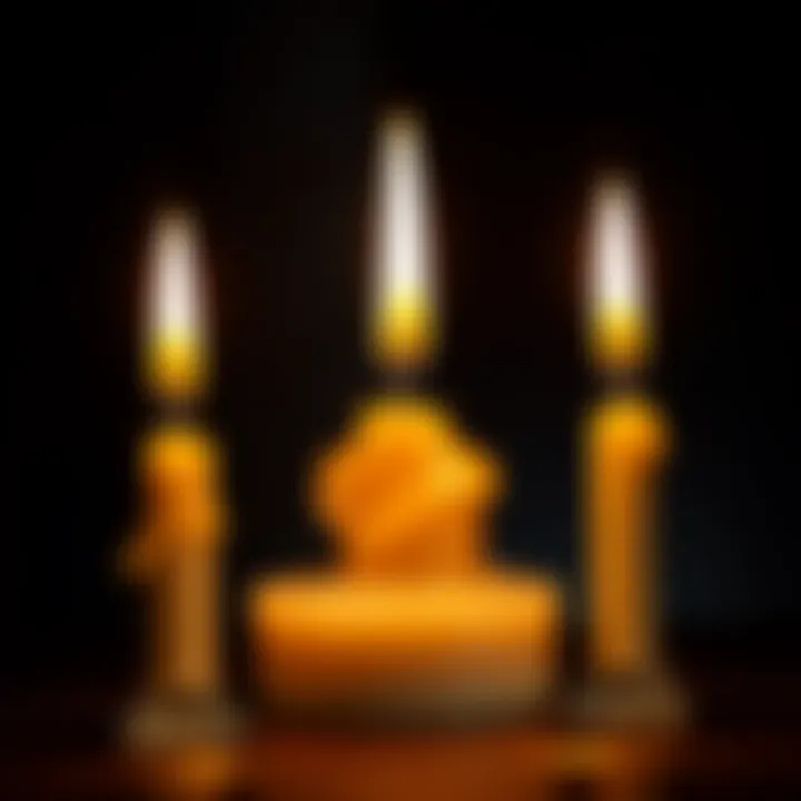 A candle with its middle wick extinguished, showing a partially melted wax surface and two still burning wicks on the sides.