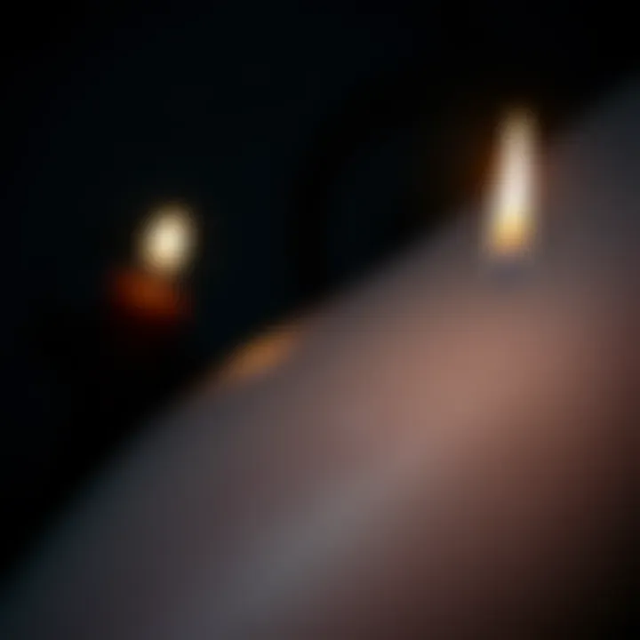 Candle and Witch Mark A lit candle with a faint mark on the skin nearby, representing a witch mark after a ritual.