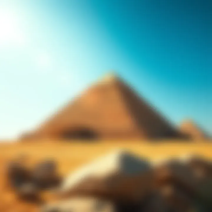 View of Cheop's Pyramid with a clear blue sky and sunlight illuminating its stones