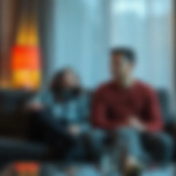 A couple sitting apart on a sofa, looking away from each other with sad expressions, symbolizing emotional distance in their relationship.