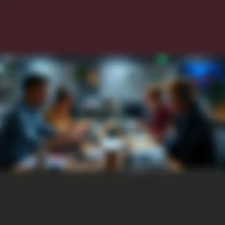 A group of content creators brainstorming ideas and writing at a desk filled with laptops and notes.