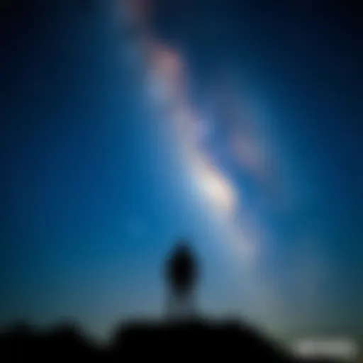 A silhouette of a person standing under a starry sky, symbolizing the connection between humans and the universe.