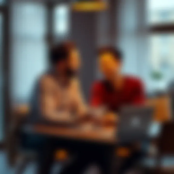 A couple sitting at a table, discussing their future marriage timeline with a notepad and a laptop in front of them