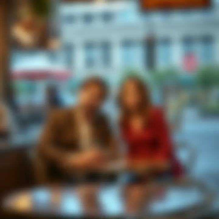 A man and woman sitting at a cafe table, with surprised expressions as they talk about a funny date mishap involving reiki.