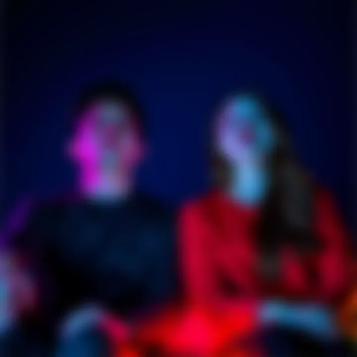 A couple sitting together, eyes closed, with peaceful expressions as they practice telepathy using binaural beats.