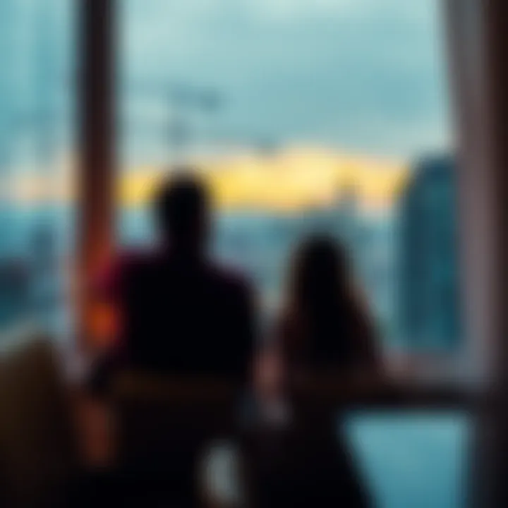 Couple in Reflection A person sits alone, looking thoughtfully out a window, symbolizing contemplation about a relationship. Soft lighting sets a reflective mood.