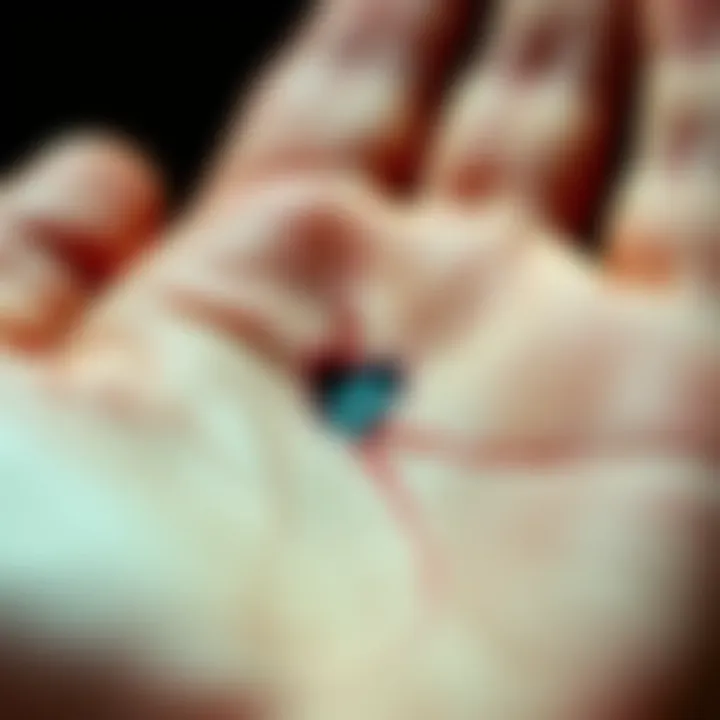 Close-up of a left palm with a visible cut above the heart line, symbolizing emotional and physical health interpretations.