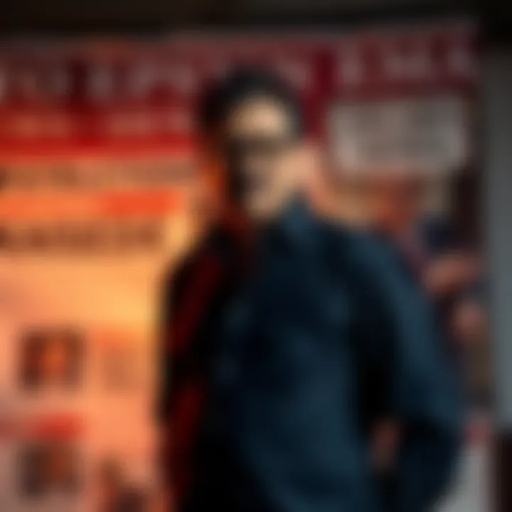 Deepak Chopra standing with a serious expression in front of a large banner featuring headlines about Epstein emails.