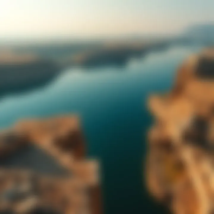 A view of the Euphrates River with hints of archaeological digging sites nearby, representing the lost tomb of Gilgamesh in Iraq.