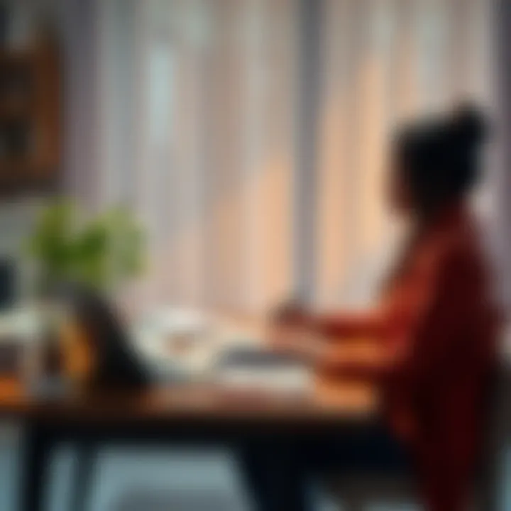 A couple discussing plans for children and finances at a table with paperwork and a laptop