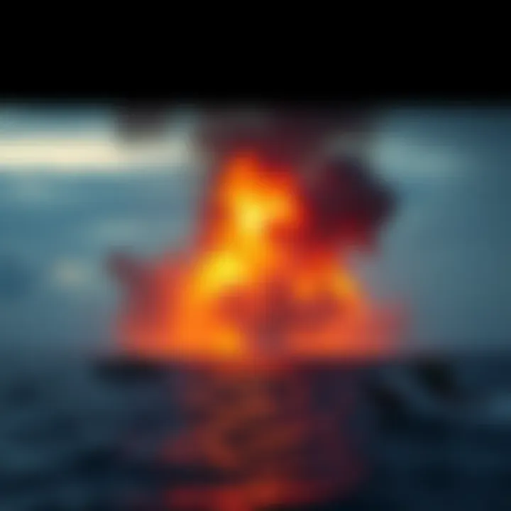 A large fire burns on the water's surface in the Gulf, with smoke billowing and emergency response teams working nearby.