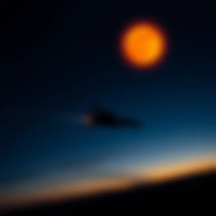 A glowing orange orb in the night sky above a fighter jet flying nearby, seen while driving through Northern Colorado.