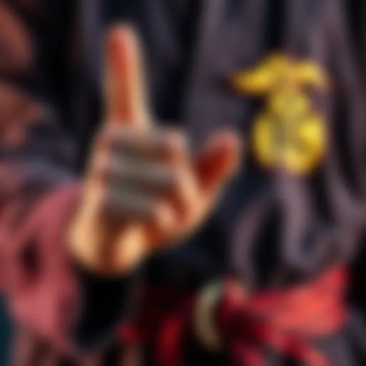 A close-up of a person's hand making a unique gesture alongside a belt symbol, showcasing cultural expression and communication.