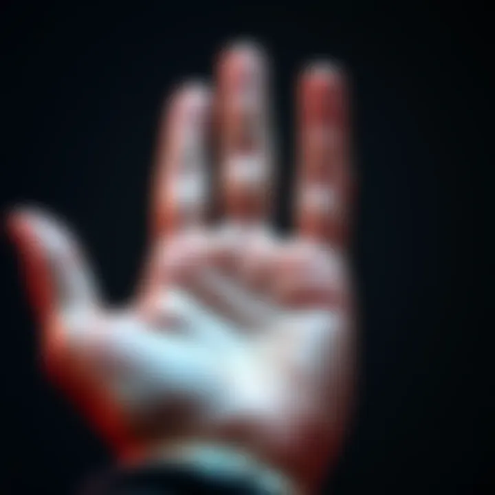 A close-up view of a person's right hand showing distinct lines on the palm, symbolizing the study of palmistry.