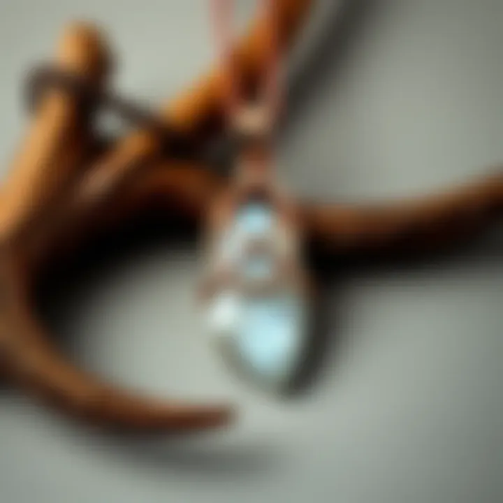 Handcrafted Antler Tip Jewelry A unique antler tip pendant with a moonstone, woven in copper, displayed on a simple background.