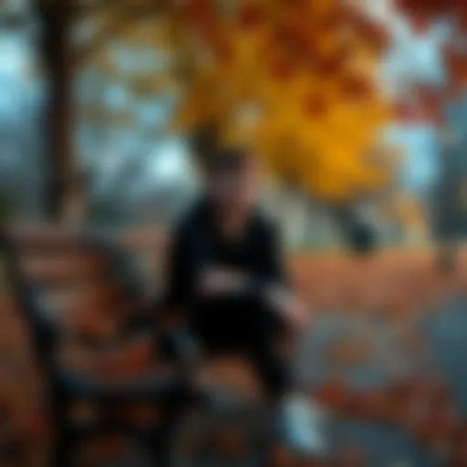 A 28-year-old person sitting alone on a park bench, looking contemplative with a sad expression, surrounded by autumn leaves, reflecting on past love and heartbreak.