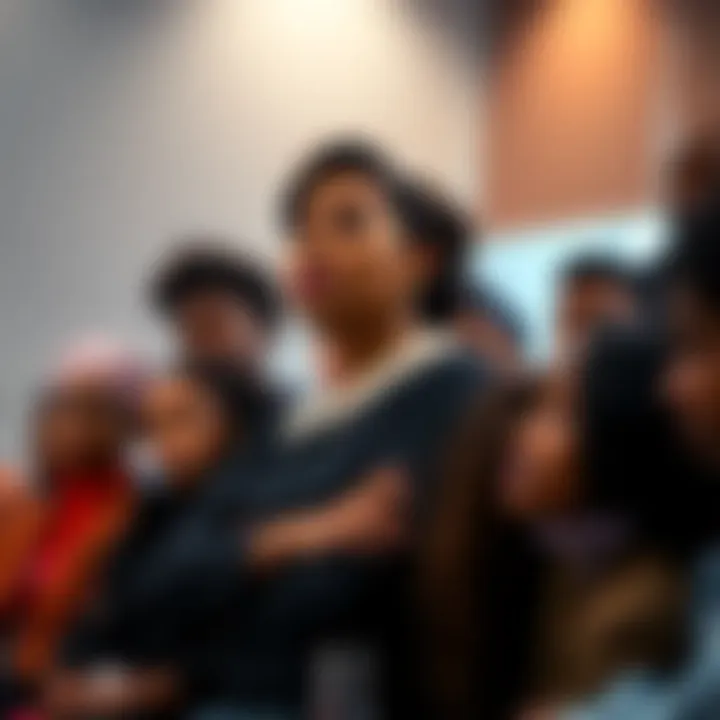 Judge Lynn Toler speaking on self-love and the importance of self-worth, with a diverse group of people listening attentively.