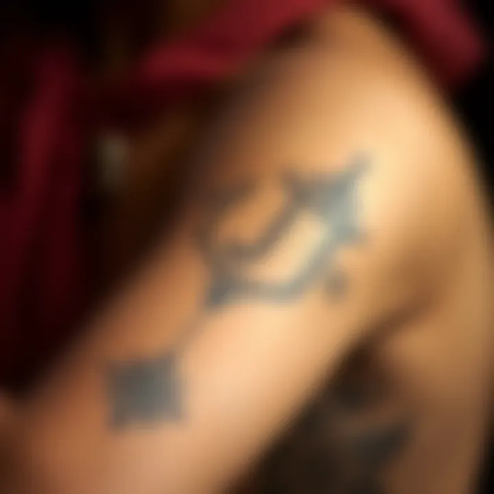 A close-up of a person's lower right arm featuring a detailed Ardra tattoo design, symbolizing astrological significance.