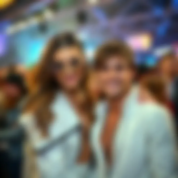 Malia Gee wearing a stylish outfit with Colby Brock at a public event, both smiling and engaged with fans