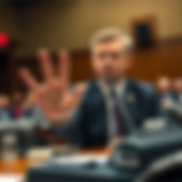 A man in the background at a congressional hearing making unusual hand gestures, raising questions about his identity.