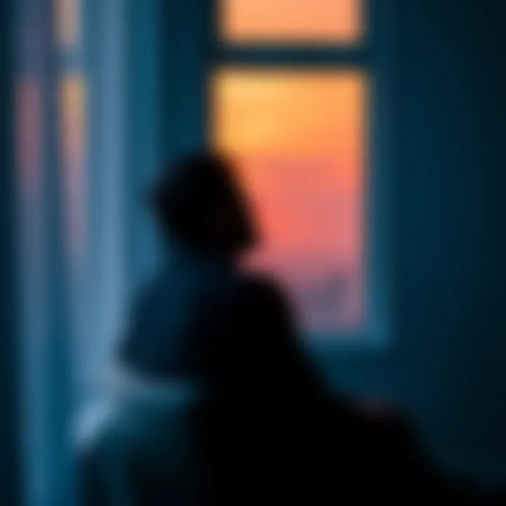 A man sits alone in a quiet room, looking out the window, deep in thought about fatherhood and life challenges.