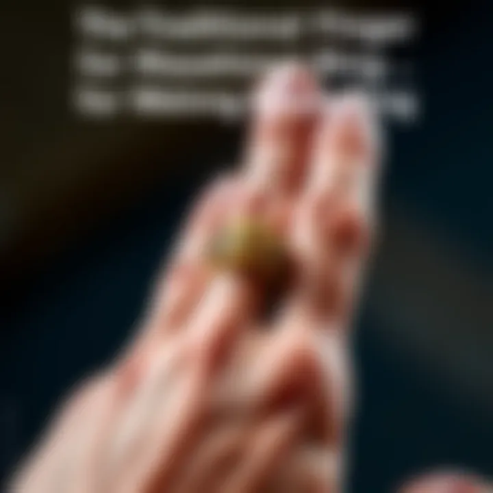 A close-up of a hand displaying a Masonic ring worn on the ring finger, showcasing its design and significance.