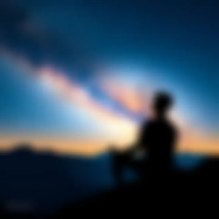 A person meditating under a night sky filled with stars, symbolizing connection to the cosmos and personal insights