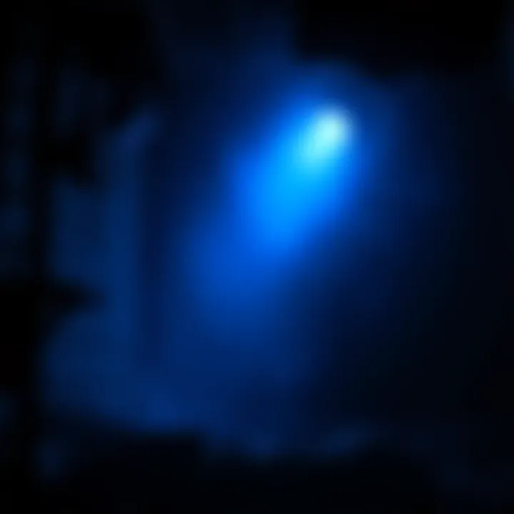 Mysterious Blue Light A bright blue light illuminating a dark area, with a faint hint of surrounding objects