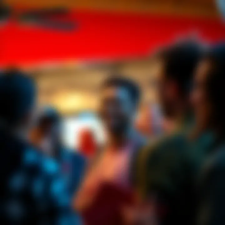 A person smiling while introducing themselves at a community event, surrounded by welcoming faces