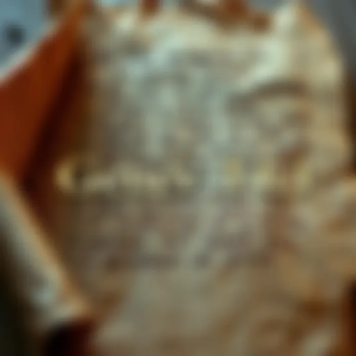 Visual representation of Genesis 1:1 in Paleo Hebrew language with a background of ancient scrolls.