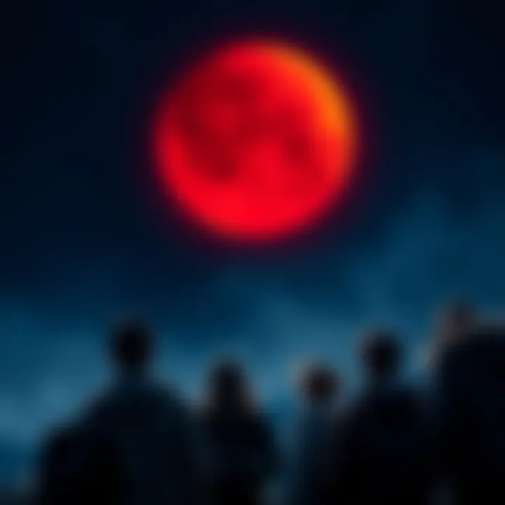 A group of people gazing at a bright blood moon in the night sky during a lunar eclipse