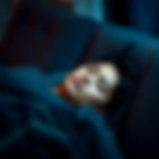 A person lying on a couch with their eyes closed, looking relaxed and peaceful during a nap.