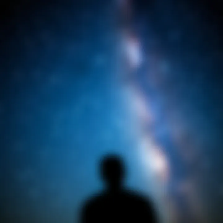 Person gazing into the sky A person looking thoughtfully at the starry night sky, reflecting on memories and past lives
