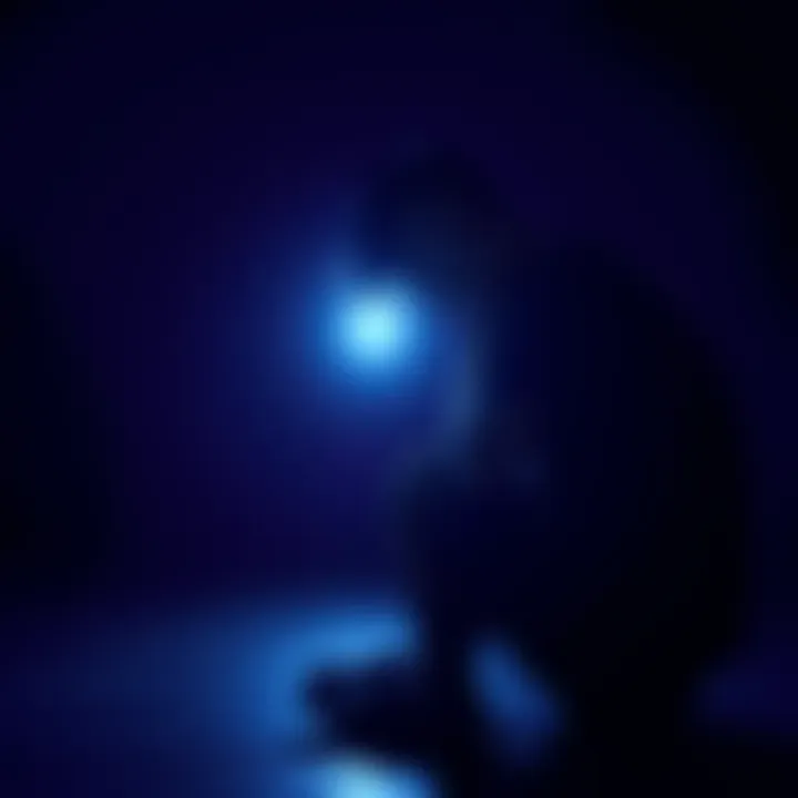 A person sitting alone, looking overwhelmed and depressed, representing struggles with mental health and spirituality.