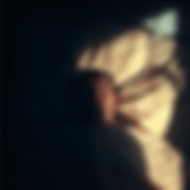 A person lying in bed with a concerned expression, surrounded by dark, swirling shadows, representing odd sensations during sleep awareness techniques.