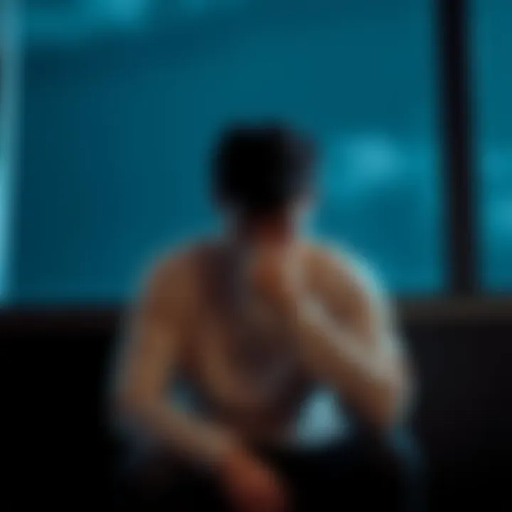 Individual sitting alone with a pained expression, reflecting on mental health struggles