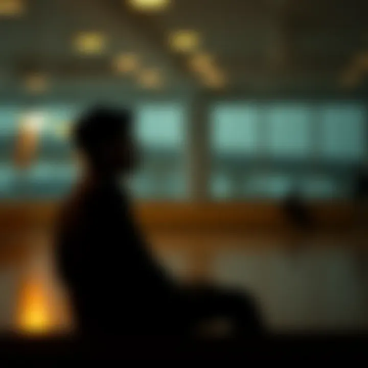 Person Reflecting on Regrets Individual sitting alone, contemplating past regrets in a quiet setting with a thoughtful expression.