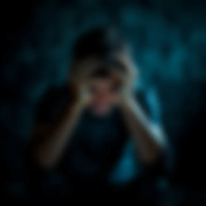 A person with an angry expression, sitting with their head in their hands, surrounded by dark shadows around them, symbolizing inner turmoil against the concept of God.