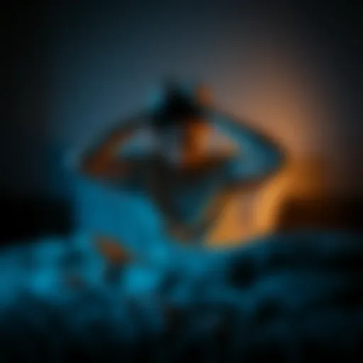 Individual sitting on a bed with hands on their head, looking stressed and tired, surrounded by a dark bedroom.