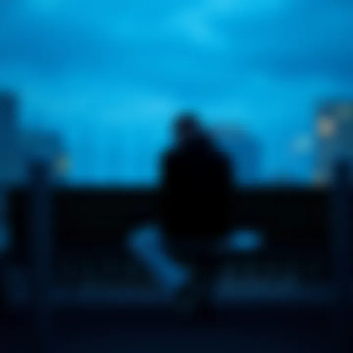 Person Reflecting on Loss A person sitting alone on a bench, looking contemplative, symbolizing the feeling of loss and introspection.