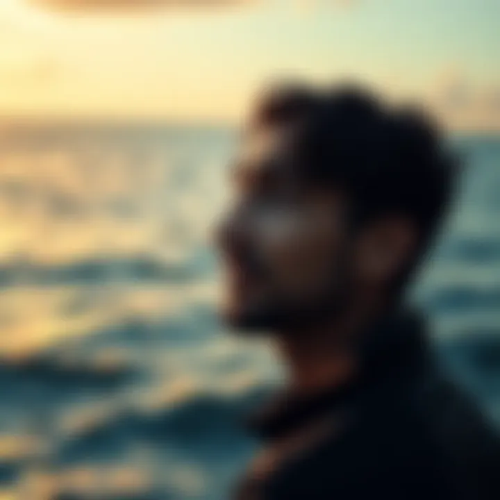 A man gazing thoughtfully at the ocean, reflecting his emotional sensitivity and depth, with calm waves in the background.